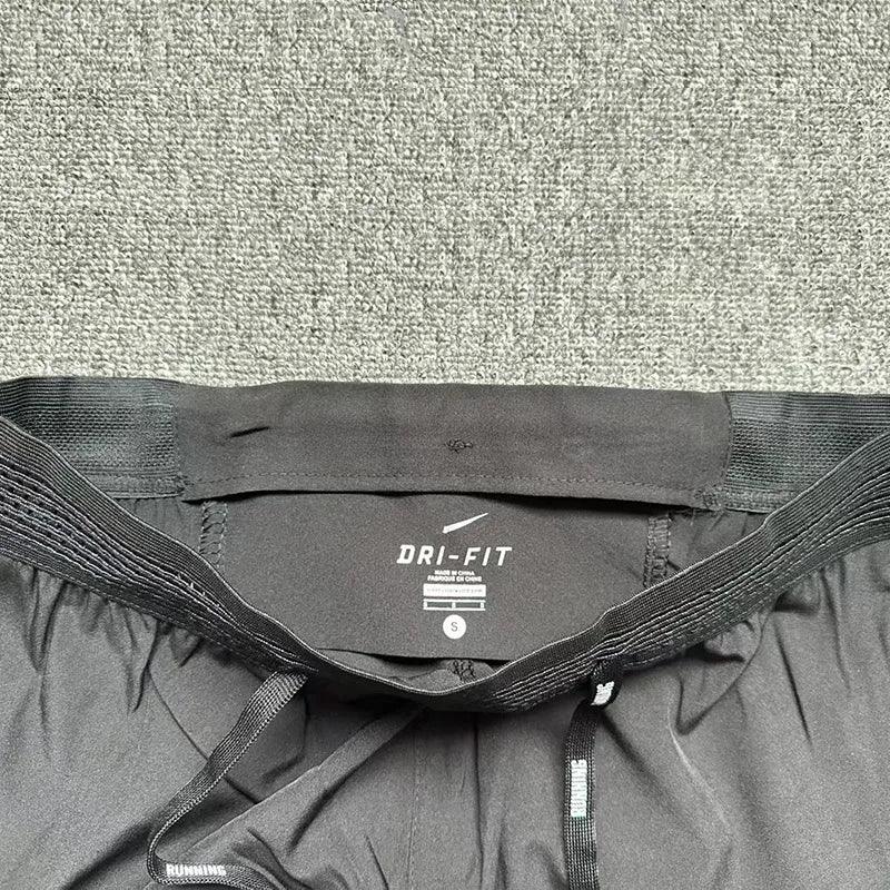 Pantalon nike runing Élégancia